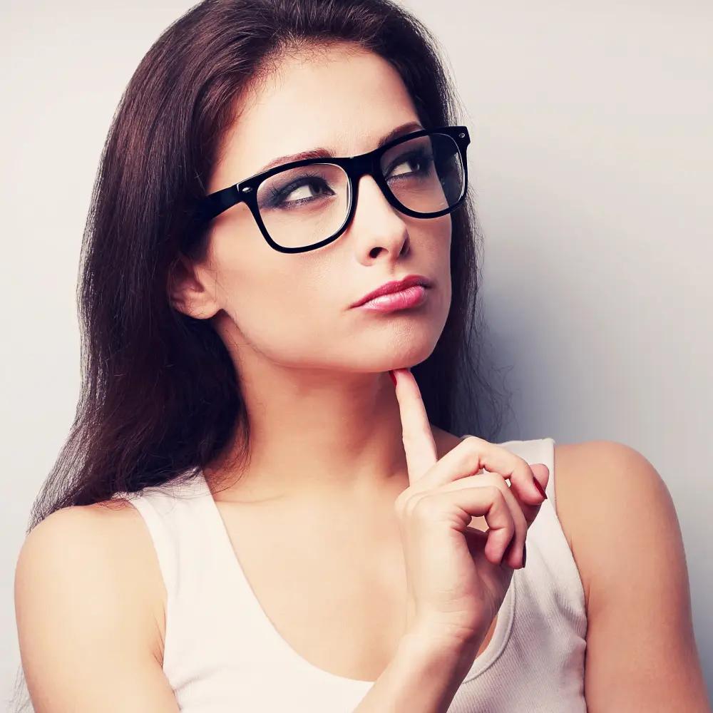 Woman Thinking About Massage - The Massage Guy - Cape Town FAQ | Frequent Asked Questions | Woman Thinking About Getting A Massage from The Massage Guy - Cape Town